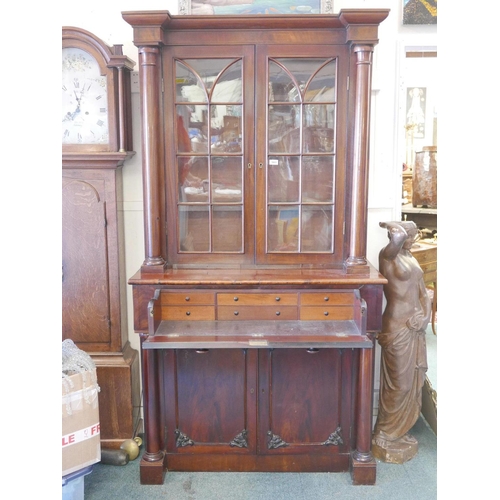 1188 - An early C19th Irish mahogany secretaire bookcase, the upper section with arched glazed doors, the s... 