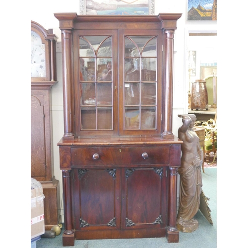 1188 - An early C19th Irish mahogany secretaire bookcase, the upper section with arched glazed doors, the s... 