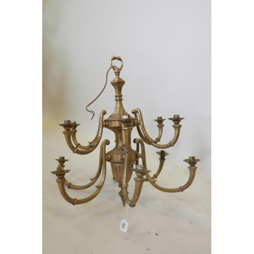 1182 - A brass two tier six branch chandelier, wired, 24