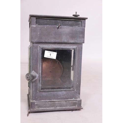 1 - A C19th copper railway lantern, with three bevelled glass windows and copper reflector, stamped G. P... 