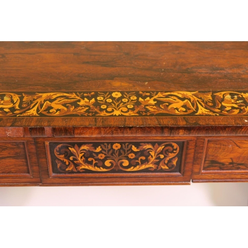 1207 - A good C19th rosewood library table with two frieze drawers and inlaid panels and borders depicting ... 