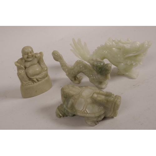 19 - Four Oriental carved green hardstone figurines, two dragons, a dragon tortoise and a seated Buddha, ... 