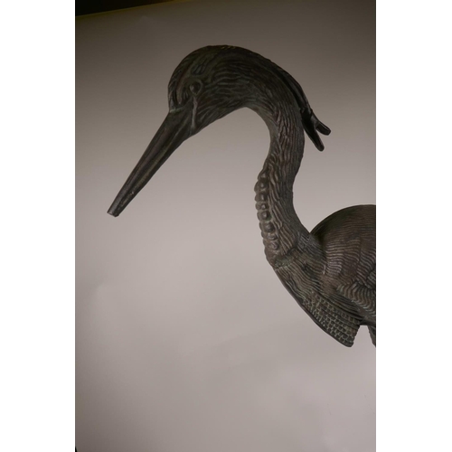 34 - A metal garden figure of a heron, 33