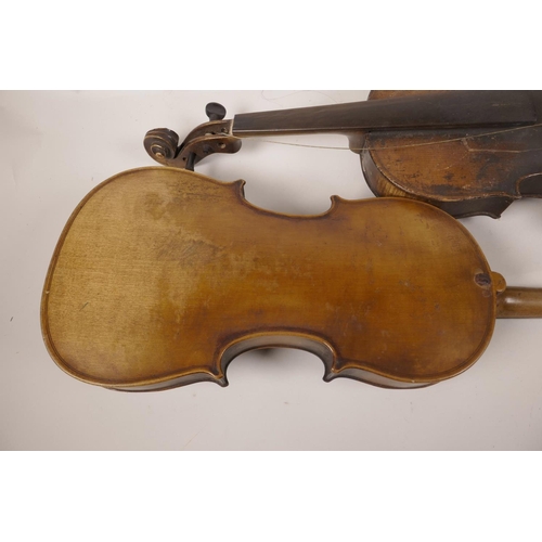 36 - Two vintage violins for restoration, one with one piece back and Stradivarius label, 23½