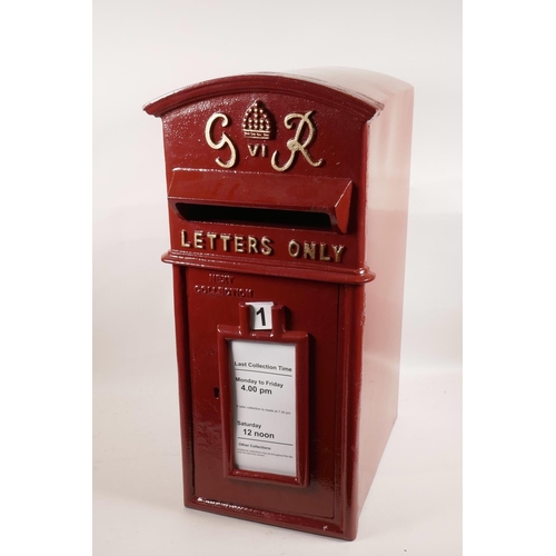 59 - A replica metal postbox with cast metal front in the early C20th style, 23