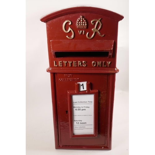 59 - A replica metal postbox with cast metal front in the early C20th style, 23