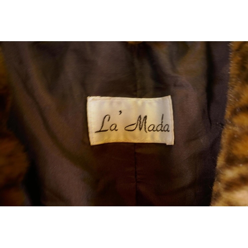 16 - A Lamada faux fur leopard print full length coat, medium/large