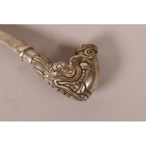 25 - A Chinese silvered metal pipe with dragon mask decoration to bowl, 2 character mark to underside, 4