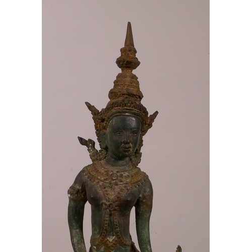 34 - A Thai bronze of a dancing woman, with verdigris patina, 16