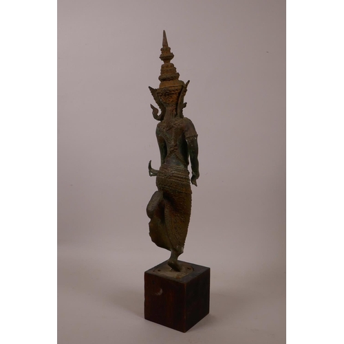 34 - A Thai bronze of a dancing woman, with verdigris patina, 16