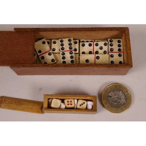 39 - A small mahogany box of miniature bone dominoes, 3¼