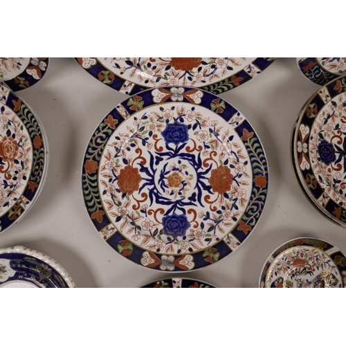 478 - A quantity of C19th Royal Crown Derby plates of assorted sizes, decorated in the Imari palette, A/F,... 