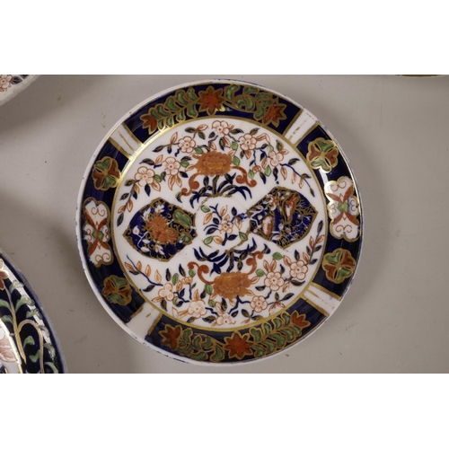 478 - A quantity of C19th Royal Crown Derby plates of assorted sizes, decorated in the Imari palette, A/F,... 