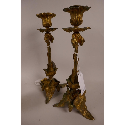 14 - Eight pieces of French gilt bronze and gilt spelter: a centrepiece in the form of a flower with leav... 