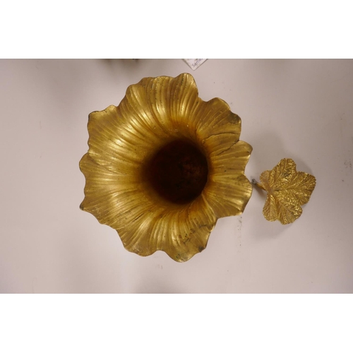 14 - Eight pieces of French gilt bronze and gilt spelter: a centrepiece in the form of a flower with leav... 