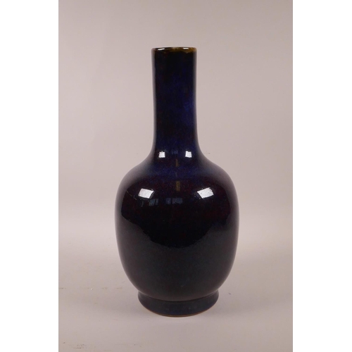 25 - A Chinese flambé glazed pottery vase, 13