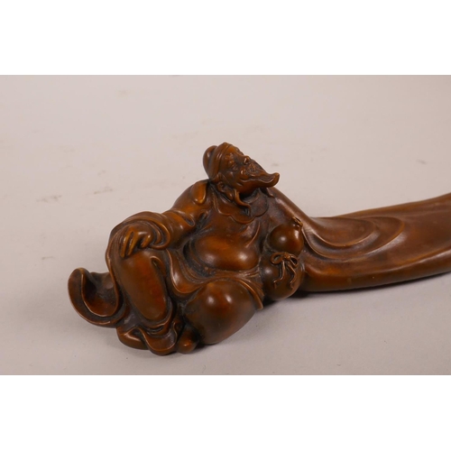 43 - A Chinese boxwood carving of a seated Lohan, 8