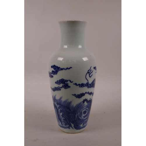 48 - A Chinese blue and white porcelain vase decorated with dragons above a stormy sea, 6 character mark ... 