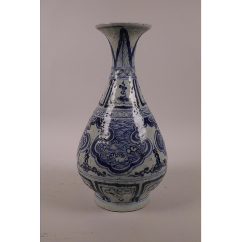 50 - A Chinese blue and white pottery pear shaped vase with archaic style decoration, 10