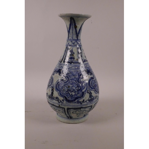 50 - A Chinese blue and white pottery pear shaped vase with archaic style decoration, 10