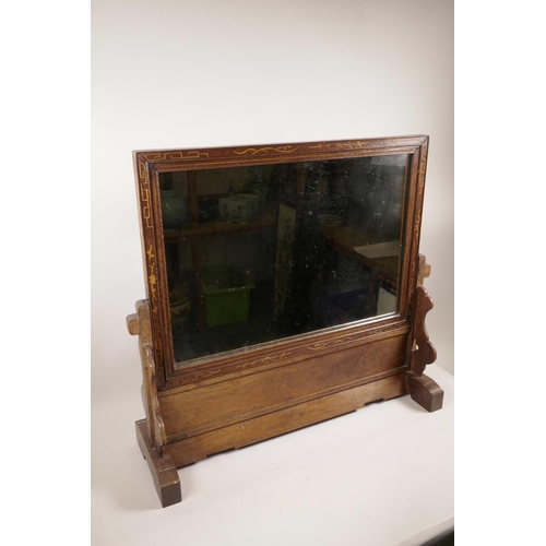 1135 - A Chinese hardwood dressing mirror with inlaid decoration, 24