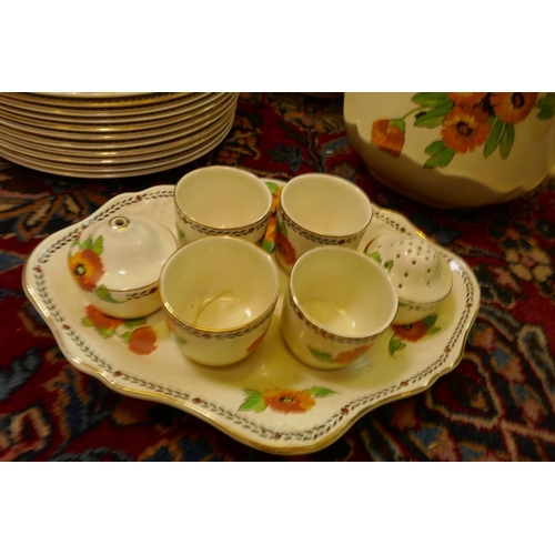 560 - An extensive vintage Art Deco Crown Ducal Marigold pattern dinner, tea and breakfast service compris... 