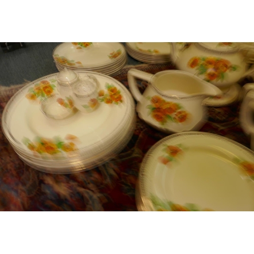 560 - An extensive vintage Art Deco Crown Ducal Marigold pattern dinner, tea and breakfast service compris... 