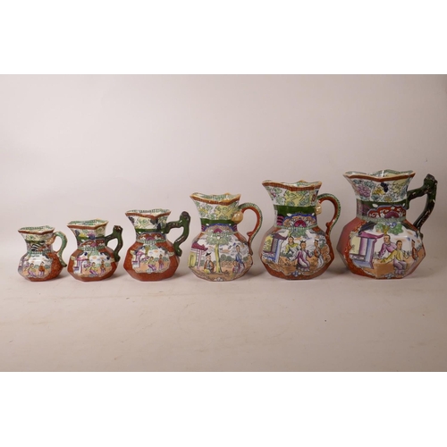 101 - A set of six C19th Mason's ironstone graduated jugs with chinoiserie transfer printed decoration, la... 