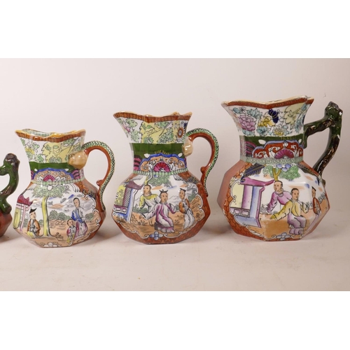 101 - A set of six C19th Mason's ironstone graduated jugs with chinoiserie transfer printed decoration, la... 