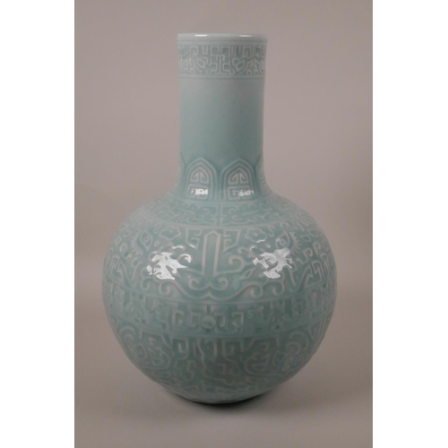 103 - A Chinese duck egg blue glazed pottery vase with archaic style underglaze decoration, 6 character ma... 