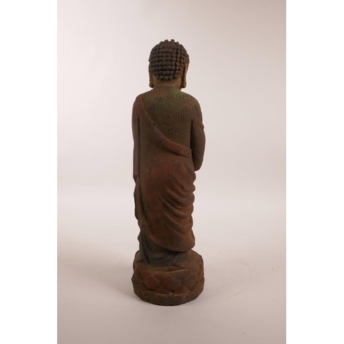 105 - A Chinese carved and painted figure of Buddha, 12