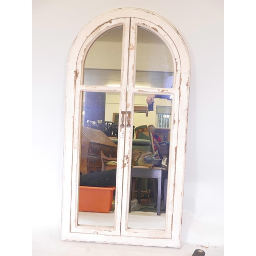 1114 - A painted and distressed arch topped wall mirror, 29½