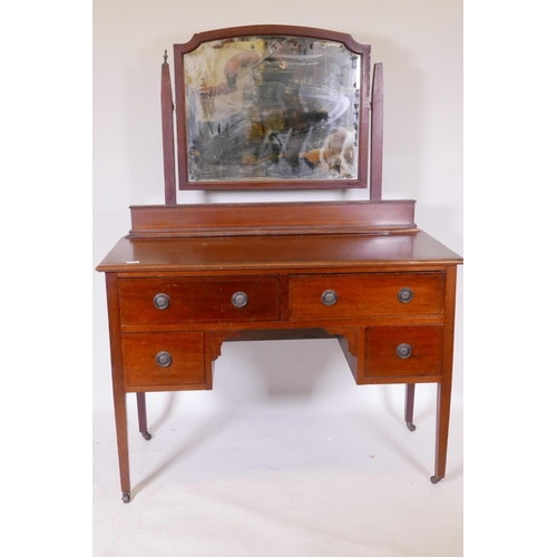 1122 - An Edwardian inlaid mahogany kneehole dressing table with four drawers and swing mirror, 45