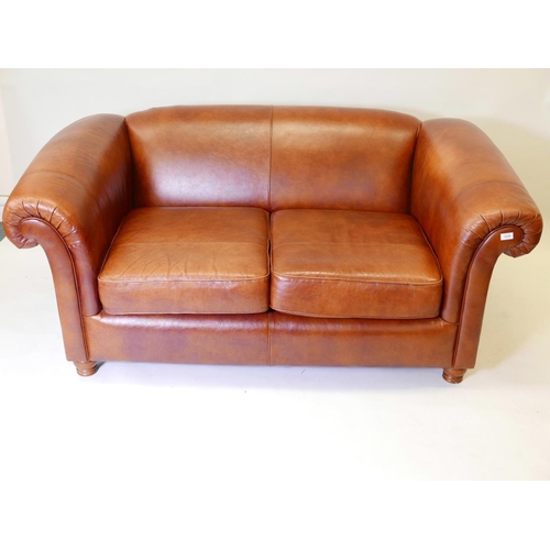 1123 - A John Lewis Derwent leather two seater sofa, 70