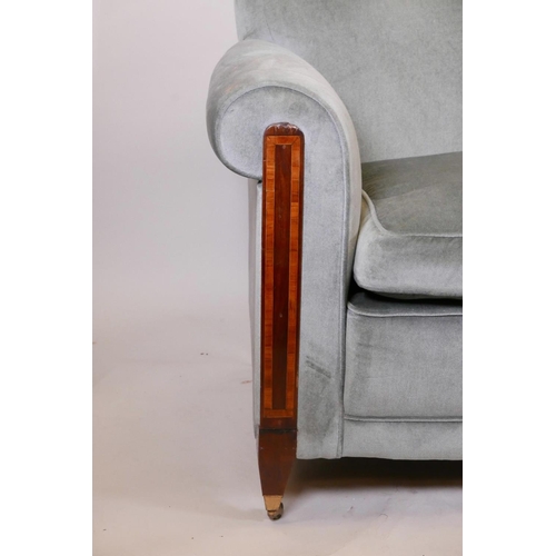 1130 - A late C19th/early C20th Continental inlaid mahogany two seat settee raised on tapering supports wit... 