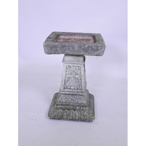 1140 - A weathered concrete bird bath, 22