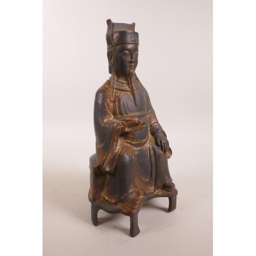 120 - A Chinese bronze of an Emperor seated on a throne, with gilt and lacquer patina, 9½