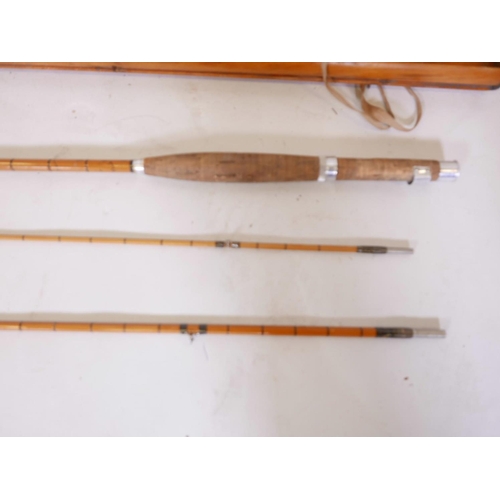 127 - A Hardy Bros split cane three section fly fishing rod by Mark Palakona in a wooden case and original... 