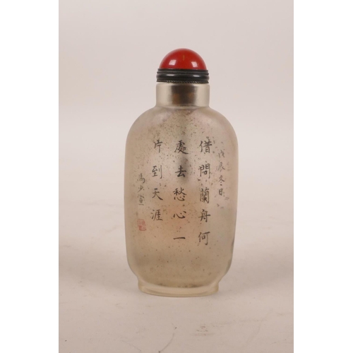 129 - A Chinese reverse painted glass snuff bottle decorated with an erotic scene, 3½