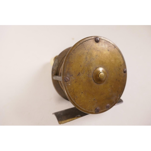 17 - A C19th brass trout fishing reel, 2⅜