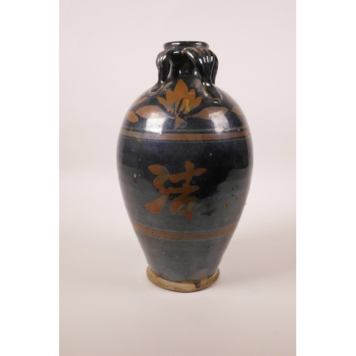 173 - A Chinese Cizhou kiln pottery vase decorated with Chinese characters, 10½