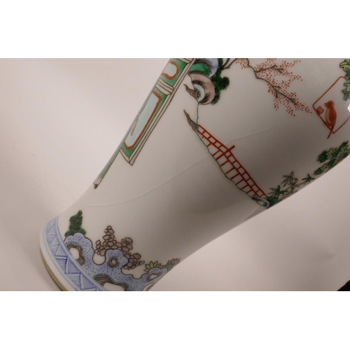 183 - A Chinese famille verte porcelain vase decorated with figures watching a performance, 6 character ma... 