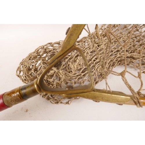 189 - A C19th Hardy Bros folding landing net with long wood handle and frame with brass fittings, 48