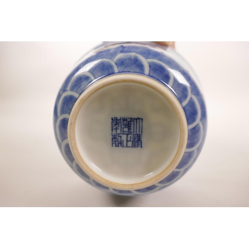 190 - A Chinese blue and white porcelain rice bowl decorated with dragons chasing the flaming pearl, seal ... 