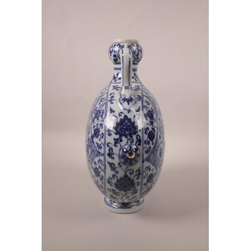 193 - A Chinese blue and white porcelain two handled flask decorated with a stylised lotus flower pattern,... 