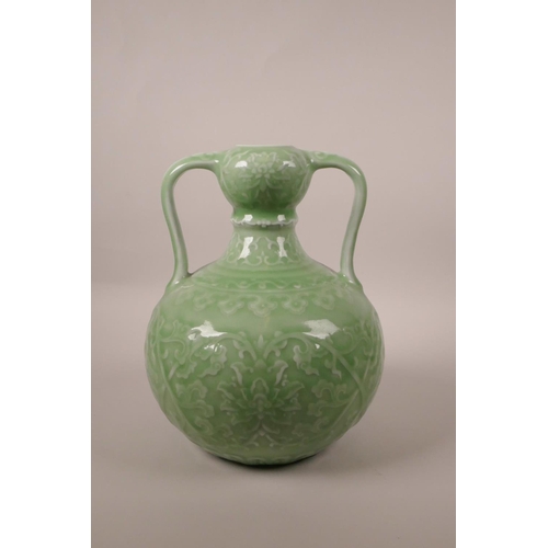 198 - A Chinese green glazed porcelain garlic head flask with two handles and underglaze lotus flower deco... 