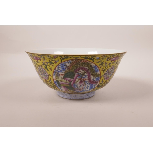 208 - A Chinese polychrome enamelled porcelain bowl decorated with dragons, phoenix, bats and lotus flower... 