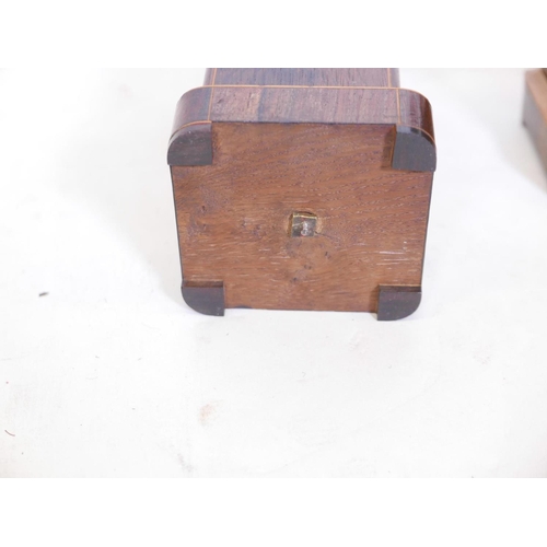 211 - A pair of rosewood and boxwood inlaid urns on stands, 10