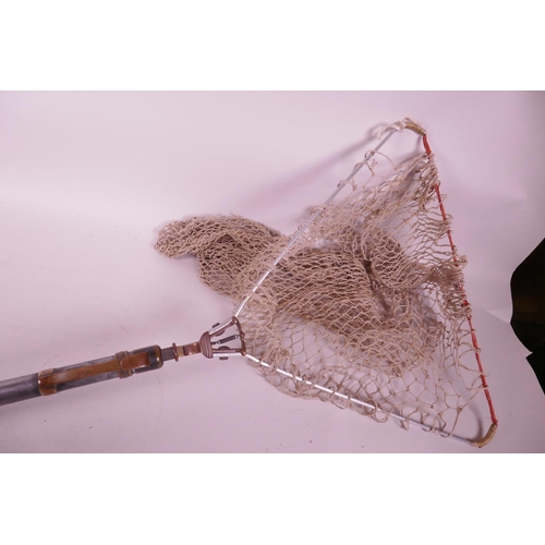 212 - A vintage Hardy Bros extending landing net with folding net, 38