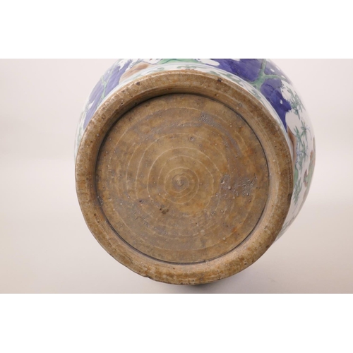 218 - A Chinese doucai pottery jardiniere decorated with kylin and fo dogs, 6 character mark to side, 8½